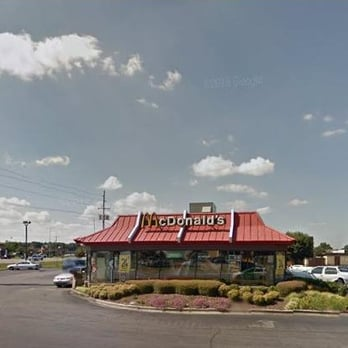 This was the McDonalds in my birth town of Decatur Alabama, called "Rockin McDonalds".
Im trying to find more pics but it was loaded with displays of retro toys, posters, and a kick ass design.

<a href="/McDonalds/">McDonald's</a> Go back to this.