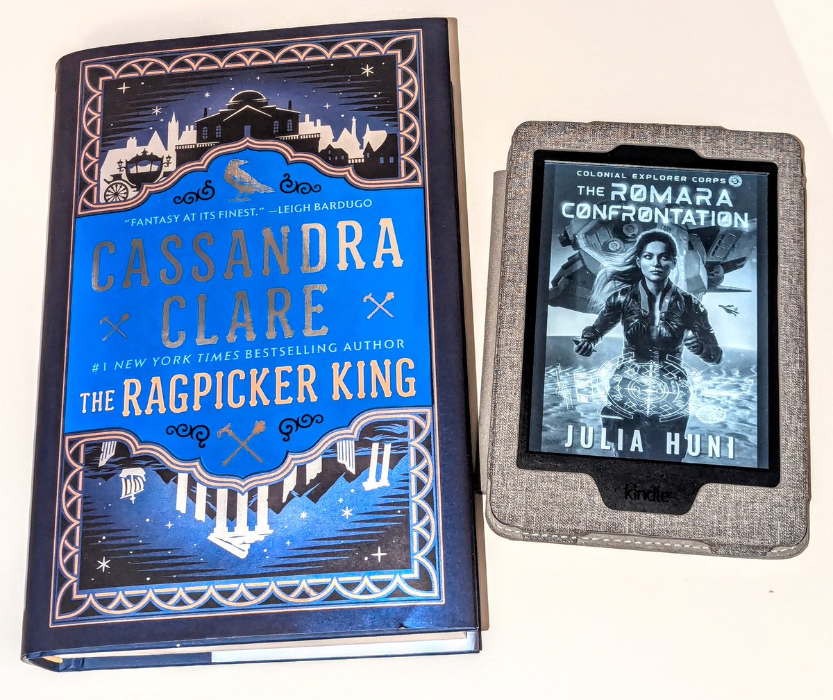 LiliLostInABook's tweet photo. It was a good day for books today. I won a giveaway &amp; picked The Ragpicker King as my prize, &amp; it arrived today! I also got an ARC of The Romara Confrontation which I have been stalking my inbox for since the author mentioned she was sending it out soon 😆 SO excited for these! https://t.co/tnBequ3YYD