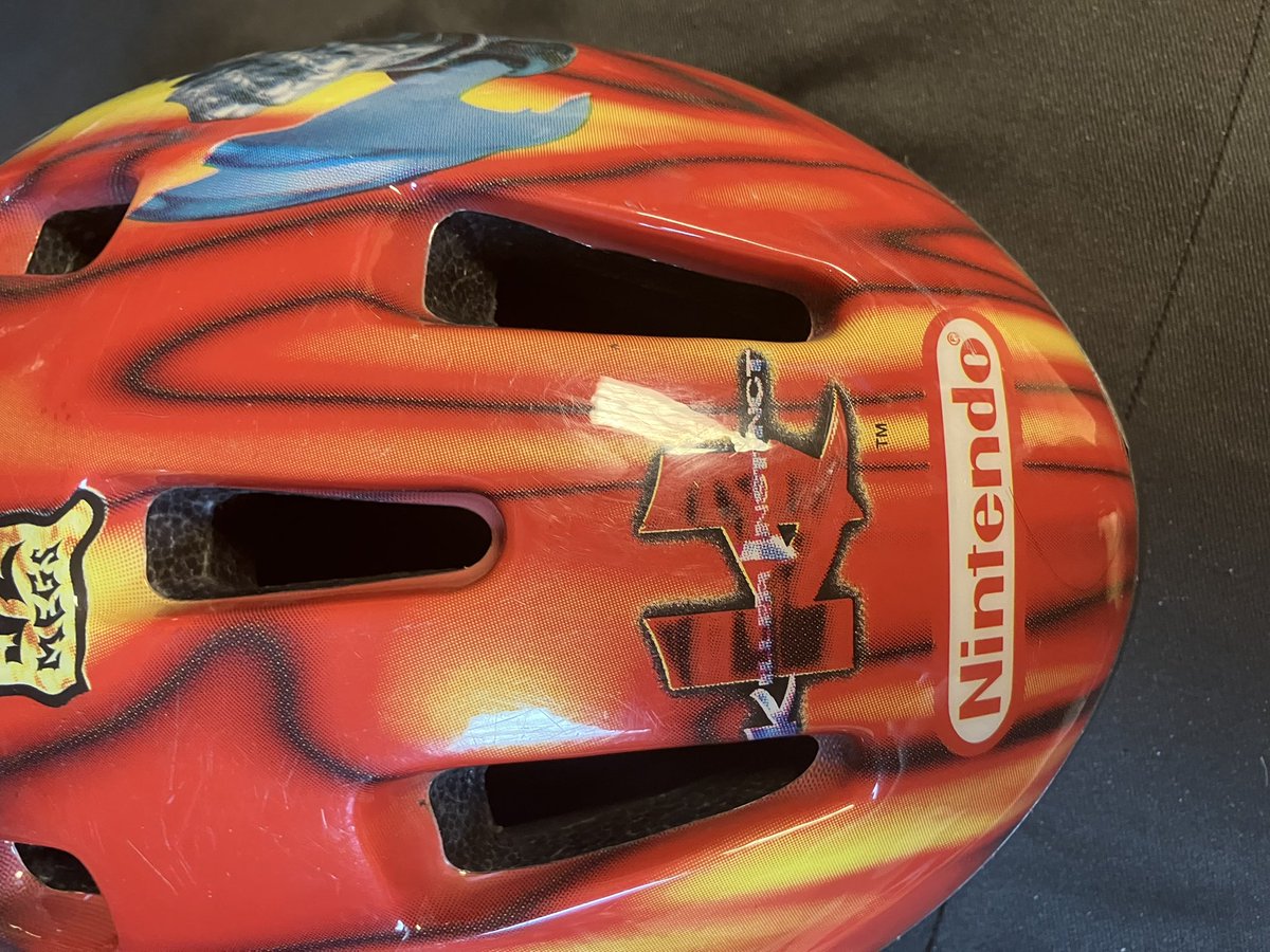 JoshGarrett1's tweet photo. @maximilian_  my friend said you might enjoy seeing this. This is a killer instinct Fulgore bicycle helmet from the Nintendo Power catalog. I found it at a local Goodwill a few weeks ago. https://t.co/asfKv4ipRy