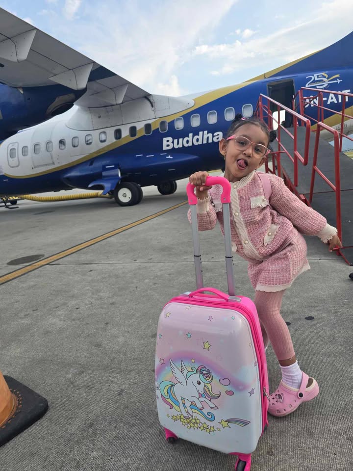 AirBuddha's tweet photo. Third time flying, and still just as excited! 🛫💖
 Our little traveler is all smiles as she boards. She loves how warmly the air hostesses welcome her every single time.  🌈✨ 
📷 Birendra Sunar
#BuddhaAir #TrustedFlying #FlyWithUs #LittleTraveler #FlyingWithJoy https://t.co/vYhGXXOIzu