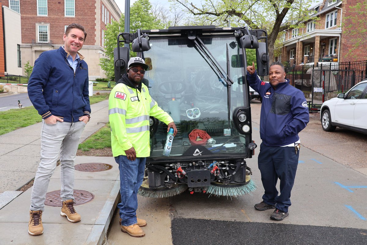 DCDPW's tweet photo. Sweep team shows @nbcwashington reporter Adam Tuss how DPW keeps bike lanes clean! Airs today @11am #SpringCleanDC https://t.co/YpzPe3cV1e