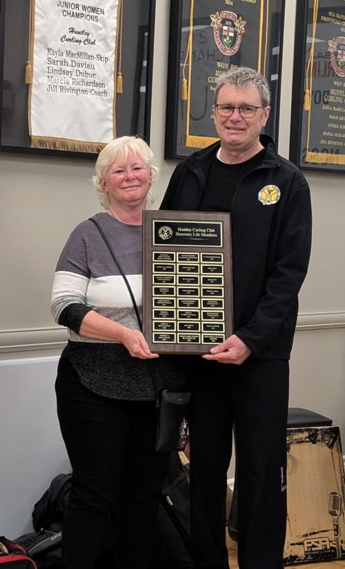 President Jeff Bird awarded Lifetime Honorary Membership status to Laurie and Ross Cotten, who have done so much for the club over the past 20+ years, especially for the Youth program. This includes educating son David so that he could rise to his current high-level coach status.