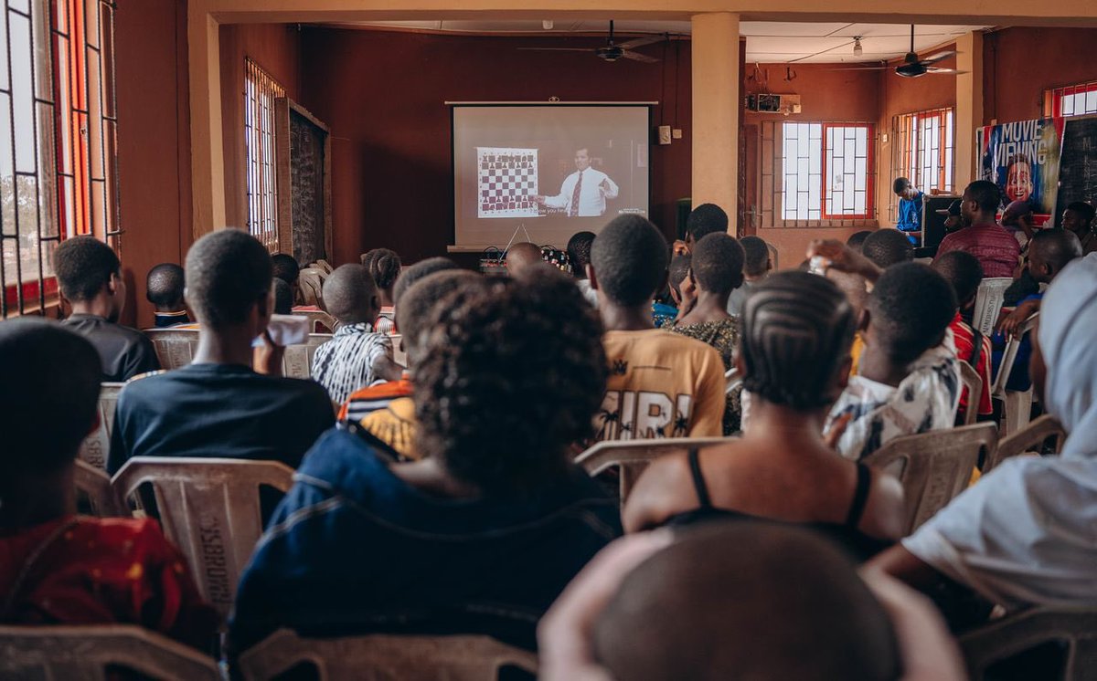 thegiftofchess's tweet photo. We gathered 200 children “125 from the slums, 25 w/ autism, 50 w/ hearing disabilities” showing them the greatest chess movies in history. It was not just a movie viewing it was a “movement” organized by @Chesstoschool to help transform the lives of children in our community 🇳🇬. https://t.co/N5kilHEW09