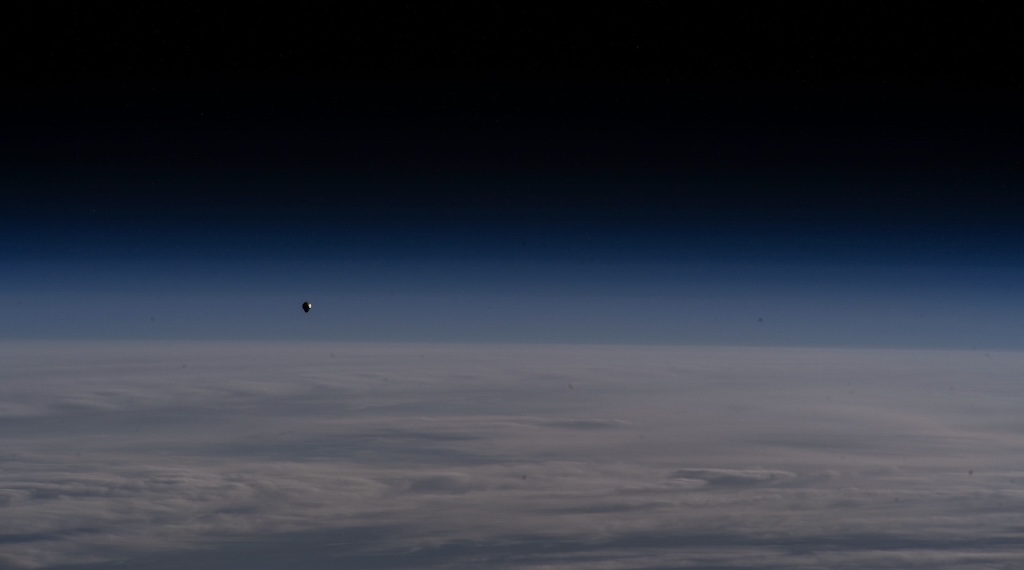 Peggy Whitson (@astropeggy) on Twitter photo It's easy to forget just how big space is. That little dot on the right is the Ax-2 crew in our spacecraft, Freedom, headed to the <a href="/Space_Station/">International Space Station</a>. I can't wait to go back! It's easy to forget just how big space is. That little dot on the right is the Ax-2 crew in our spacecraft, Freedom, headed to the <a href="/Space_Station/">International Space Station</a>. I can't wait to go back!