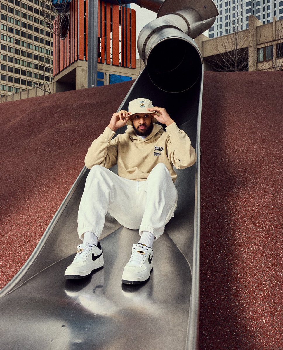 DWhite on the cop slide is instantly an iconic Boston sports photo