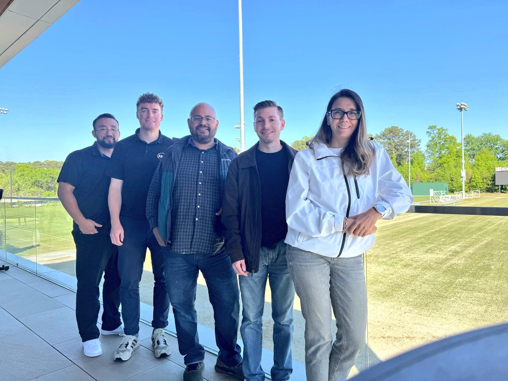AccessibAll's tweet photo. Our #TeamADC From the training room to the commentary booth, we're building a team ready to change the game together. 🗣 Because inclusion isn't just an idea. It is a team ⚽
ALT: A group of five smiling ADC team members standing outside on a sunny day, overlooking a sports field https://t.co/MZTo1Ss5by