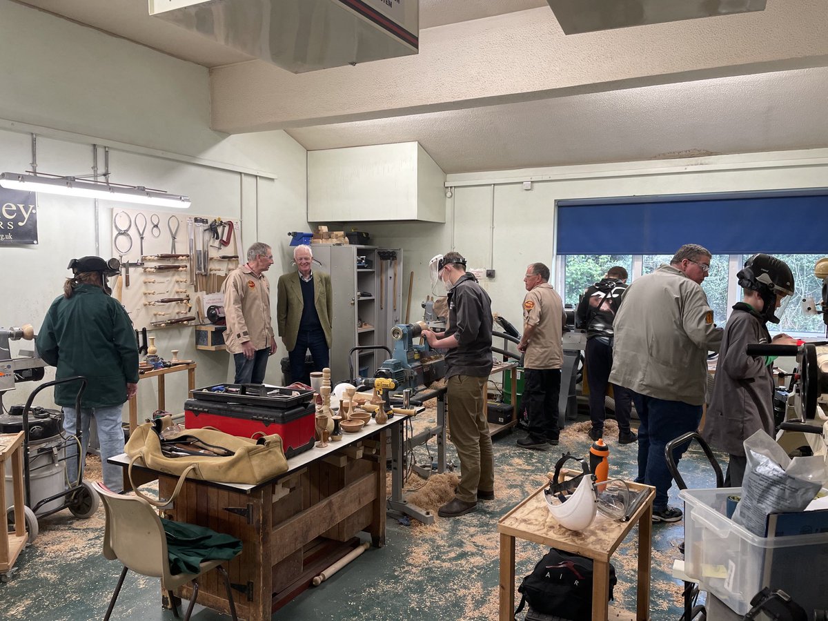 The Master of ⁦<a href="/Turners_Company/">Turners of London</a> and tutor Peter Bradwick watch the successful Youth Turning day in Cwmbran today. Great to see seven youngsters learn the craft, and later receive their certificates.