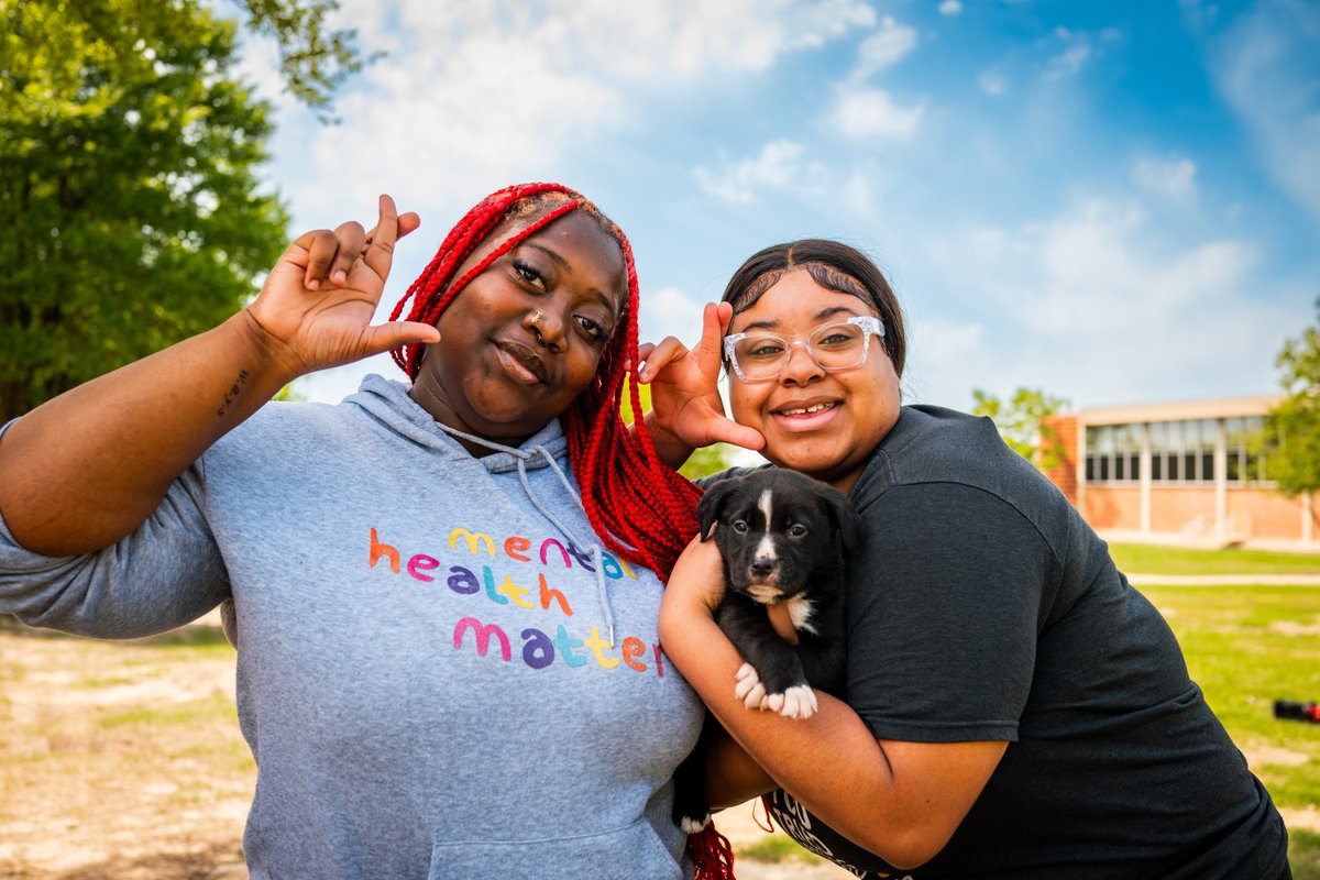 Plenty of biiiiiiiiig stretches at Puppies and Poses yoga on the #ETAMU Great Lawn last week!