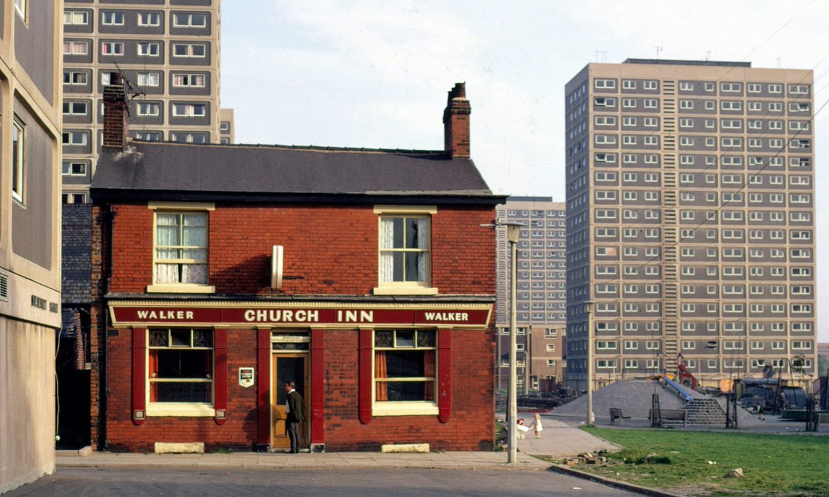 Overlapping Worlds.

I've always loved this jarring scene. 
In spite of the monstrous early 60s grey social redevelopment of Pendleton around what became Salford Precinct, this pub defiantly stood until 1976.

📷 Not known