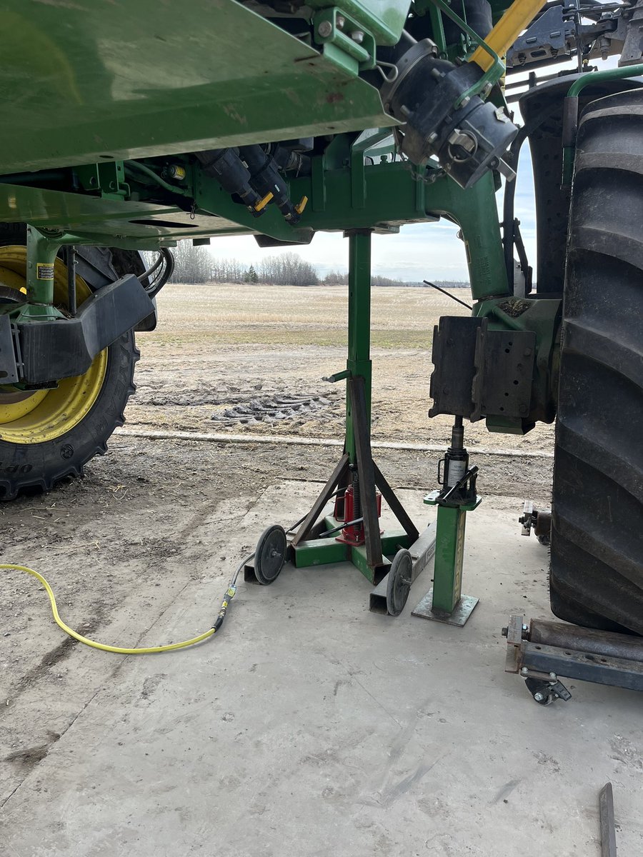 Putting the spring boots on the sprayer, anticipating some soft ground during #spray25.

Couldn’t do it without a tire handler &amp; sprayer lift built out of scraps in the shop!

What gems have other farmers built that make these tasks easier/possible?