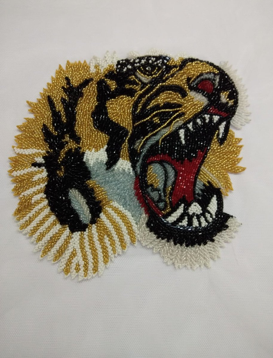 This bold hand-embroidered tiger motif is crafted with fine cut beads and intricate detailing — capturing power, attitude, and craftsmanship in one striking design.

Perfect for:
Luxury jackets |Denim | Appliqué patches

Contact Us for More Details:
+91 91363 04295

#SadulBadul