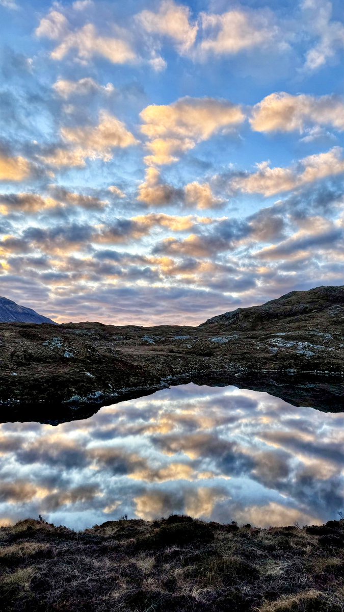 I took this at the foot of Suilven, the sun still hadn’t quite risen and the mackerel sky reflected in the Lochan just made the picture.