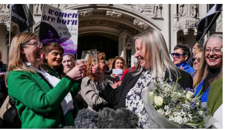 joannacuddle's tweet photo. F*ck off BBC posting pics of noted transphobes celebrating with flowers and champagne, like they've just got married. Is this ruling going to positively affect any c1s women's life? No. https://t.co/XZUu5CrEj1