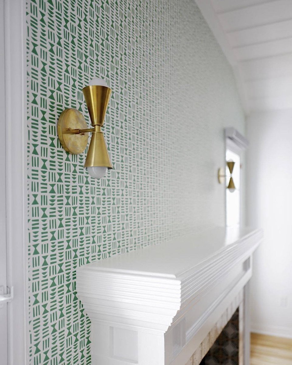 We love the crisp, clean white woodwork paired with our Hieroglyph Kew Wallpaper. The gold accent wall lights finish the room of beautifully.
<a href="/SouthBayGreen/">Daniel Wang</a> 
#missprint #missprintwallpaper #wallpaperinsipration #greenwallpaper #stylingtips #wallpaperideas #wallcovering