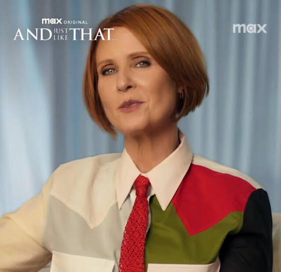 Partisan_12's tweet photo. American actress Cynthia Nixon promotes ‘And Just Like That…’ wearing the Pal€stinian flag.

It looks really good! https://t.co/gAVAJhzvU7