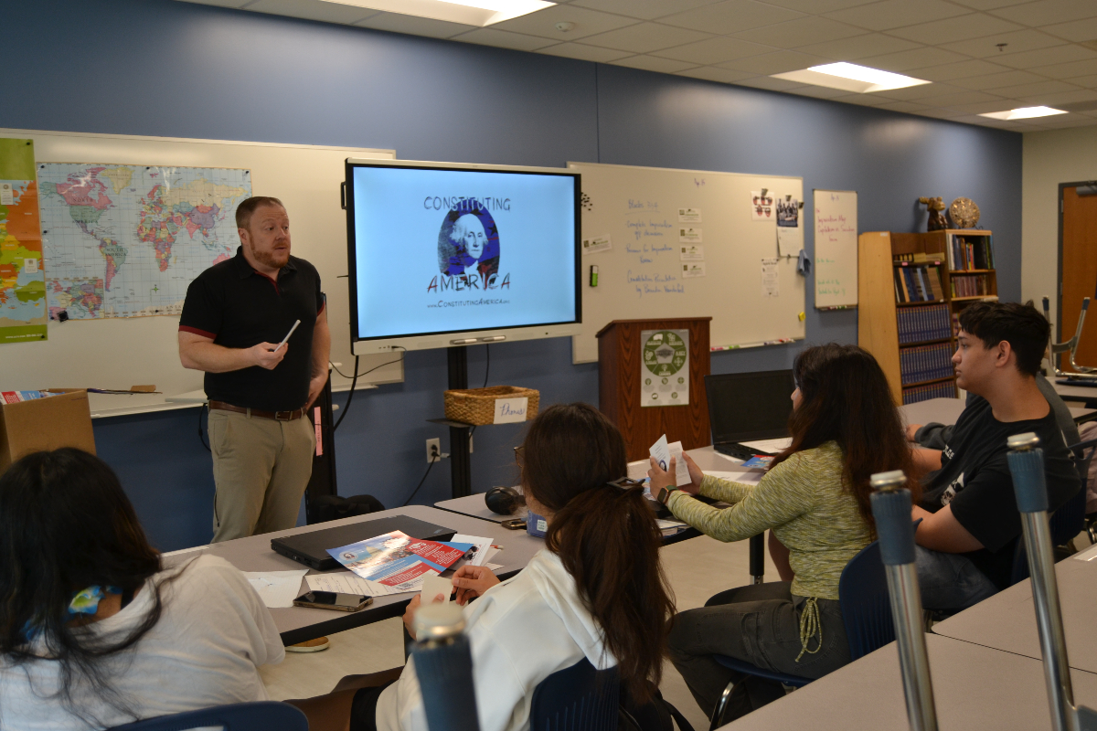 UCEarlyCollege's tweet photo. Brandon Vanderford from @ConstitutingUSA, a non-partisan, non-profit organization, visits #UCEC social study classes, giving out Constitutions and enhancing civic mindedness. #ucecproud #teamucps #cyclonestrong #ucpspog @UCPSNC @AGHoulihan https://t.co/bQKgNlPS7P