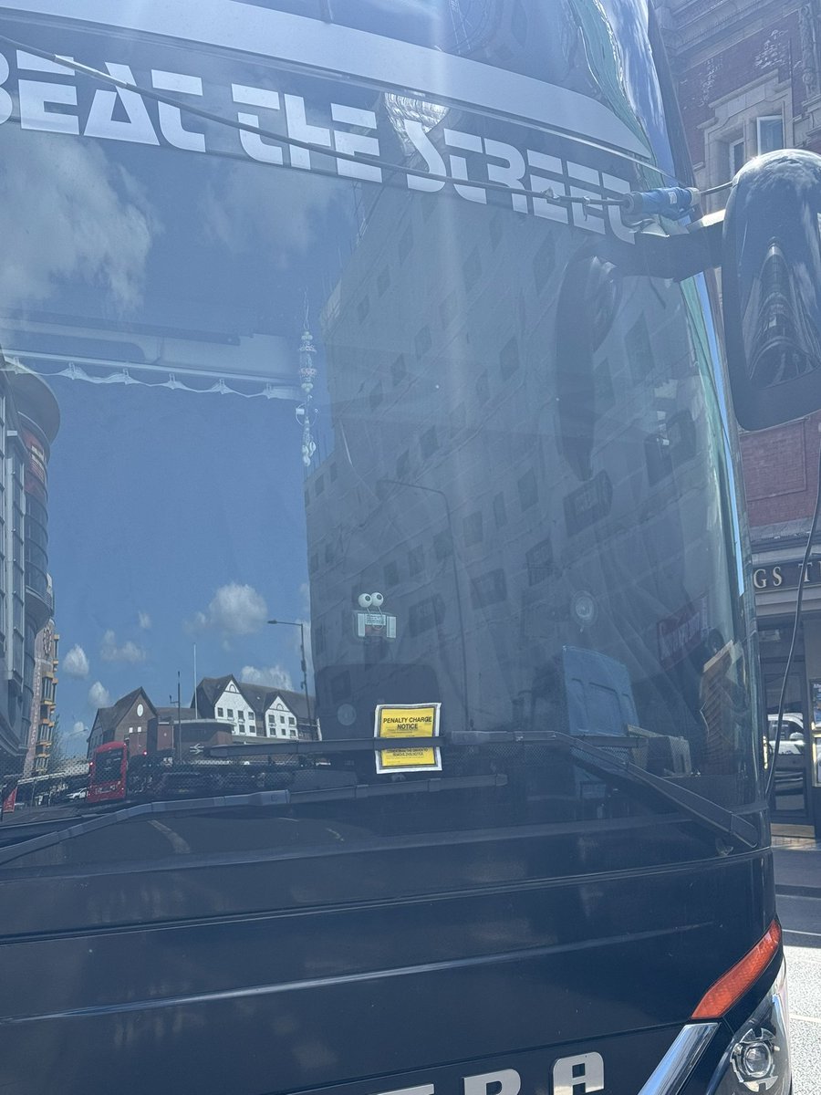 InhalerBuzz's tweet photo. ⚠️🚎 | Inhaler’s tour bus outside PRYZM Kingston has been given a parking ticket. https://t.co/EN4idU08Wl
