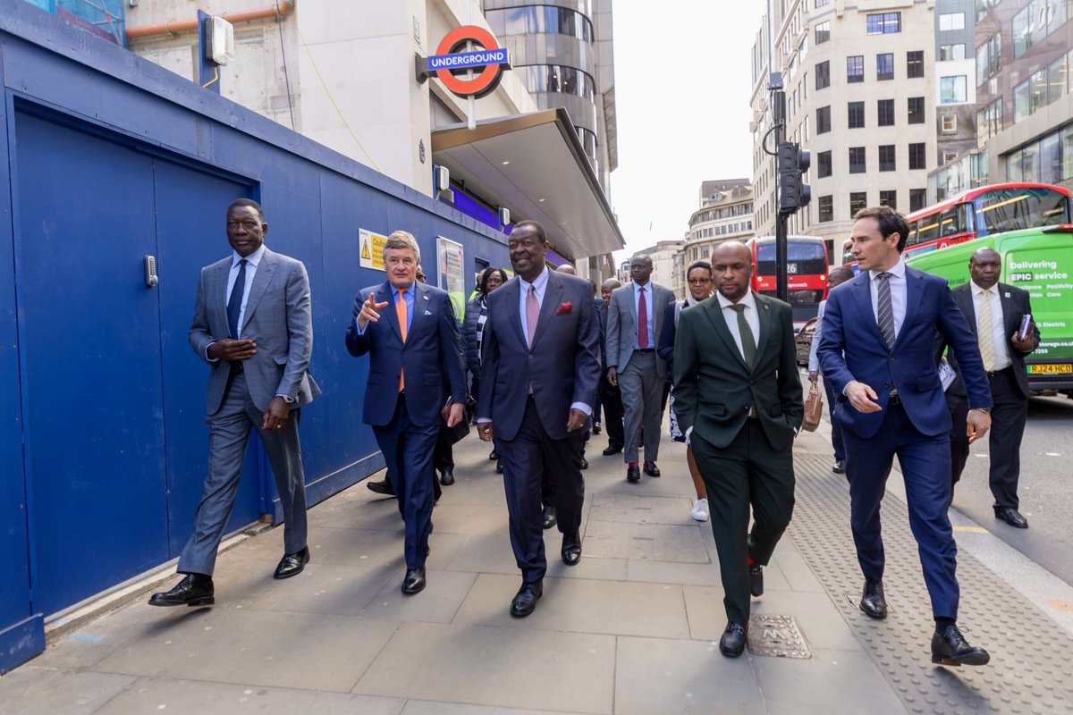 MusaliaMudavadi's tweet photo. Exploring railway innovation in London has deepened my appreciation for what we’re building back home.

The Nairobi Railway City, Kenya’s own multimodal, transit-oriented urban hub, is set to become the heartbeat of our capital. Sitting on 438 acres within Nairobi’s CBD, this transformative project aligns with Vision 2030, the Fourth MTP (2023–2027), the Bottom-Up Economic Transformation Agenda, and the Kenya Railways Strategic Plan.

With seamless integration into Nairobi’s broader transport ecosystem, including NIUPLAN, the Nairobi Mass Rapid Transit Study, and the Commuter Rail Master Plan, we’re laying the tracks for a connected, future-ready city.

I was joined on this tour of London’s Bank Town and Moorgate Elizabeth Lines by CS Davis Chirchir, Attorney General Dorcas Oduor, and members of the National Assembly’s Transport Committee.