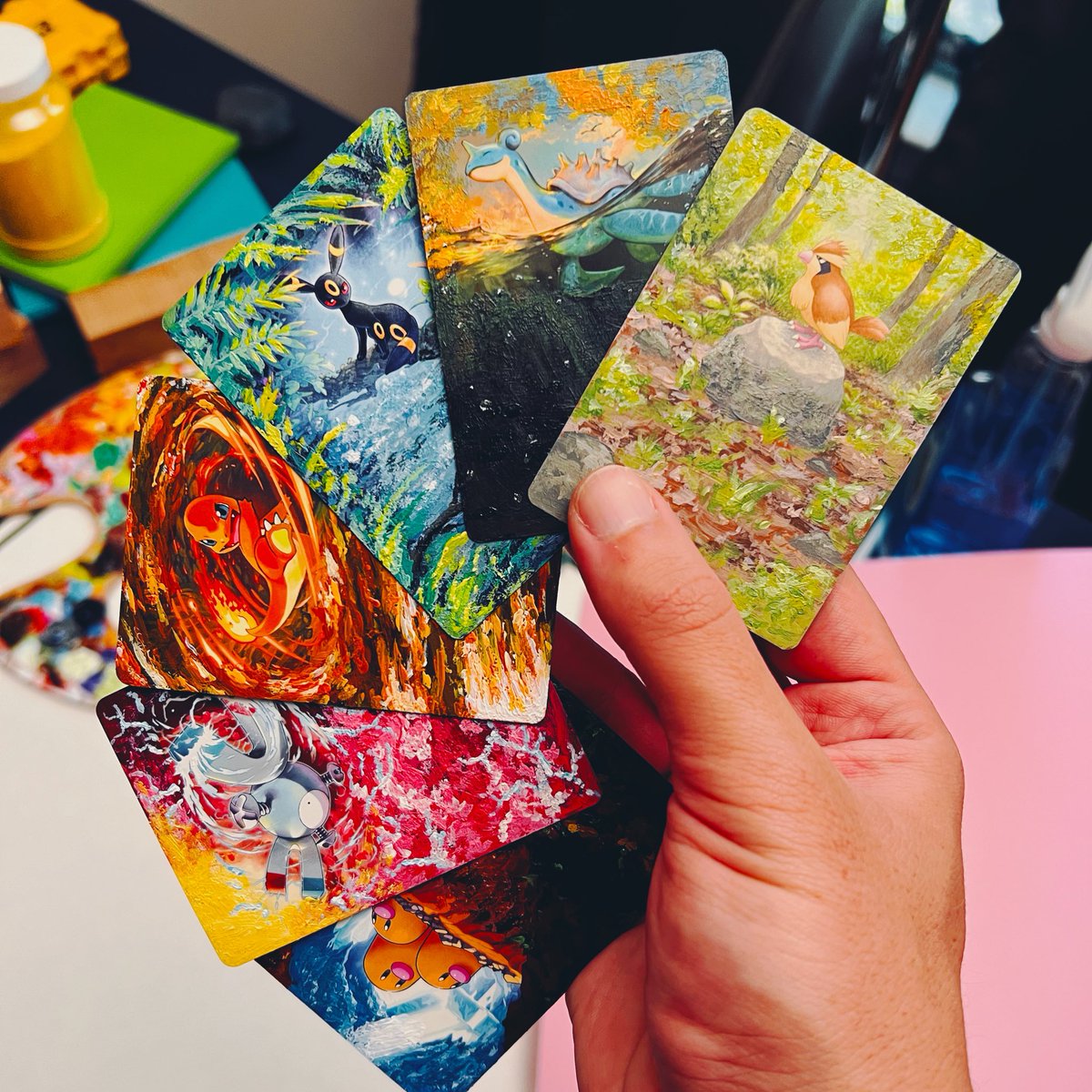 My first painted Pokemon card drop at 5 pm EST 

Featuring Charmander, Dugtrio, Magnemite, Umbreon, Lapras, and Pidgey.

Will come in a case, as well as initialed on the back.