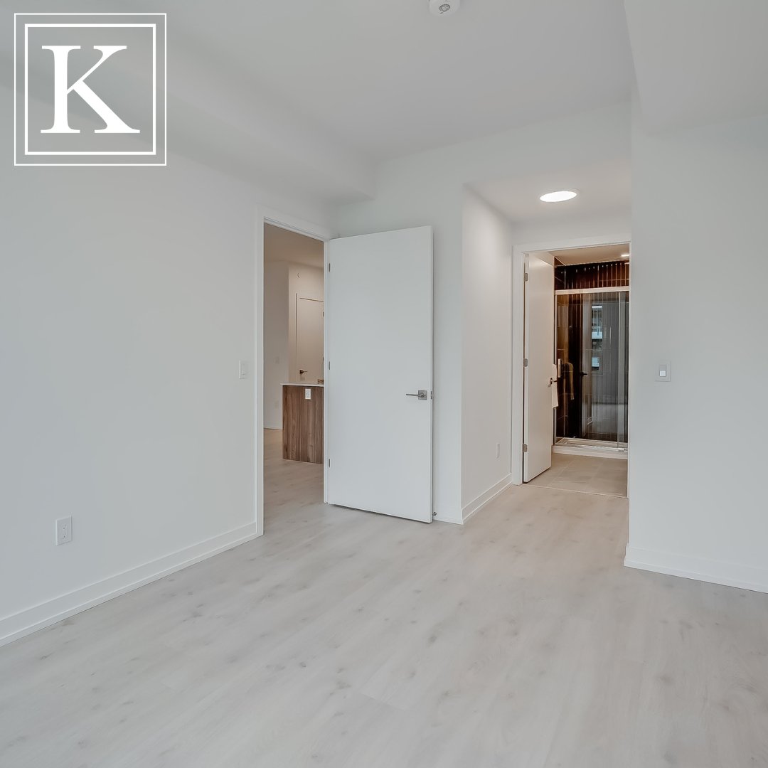 Welcome to Suite 547 at 2501 Saw Whet Boulevard — a sophisticated 2 bed + den, 2 bath residence in the prestigious Saw Whet Condominiums. This brand new suite showcases elevated finishes, a sleek modern kitchen, and a spacious, designer floor plan.