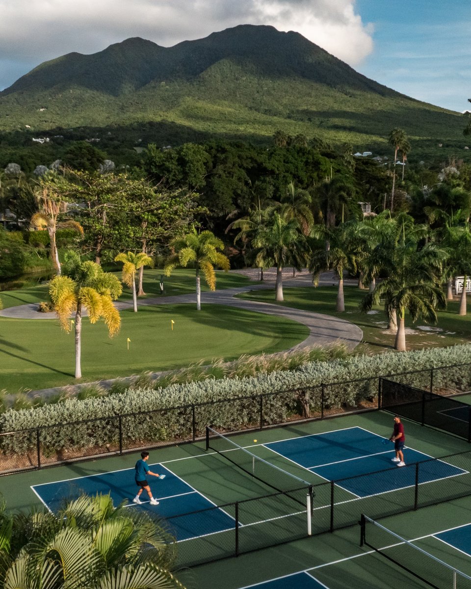 Serve up your best shot with Nevis Peak as your backdrop because pickleball in paradise has never looked so good. #FSNevis