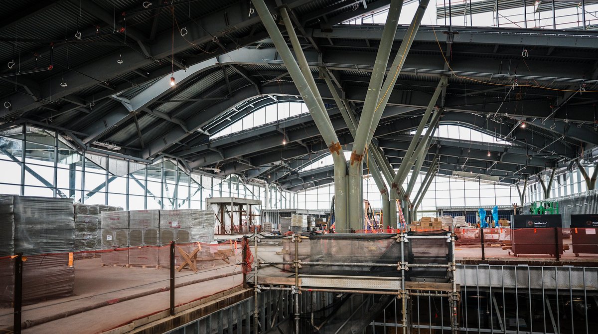 PITairport's tweet photo. Look how far we've come! These were taken a year apart on the departures level of our new terminal 🤩

The terminal's ceiling and lighting mirror Western PA's rolling hills and starry skies, while the region’s forests inspire the tree columns 🌳 ✨ https://t.co/V84jrnPYri