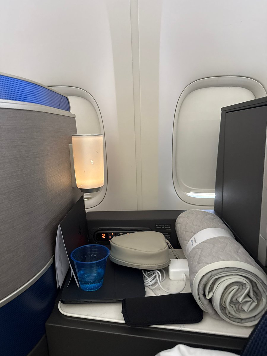 Tried <a href="/united/">United Airlines</a> for my usual USA-BLR trip instead of <a href="/emirates/">Emirates</a>... let's just say the experience inspired a haiku. 😅

Paid more for this seat,
Wall view and a plastic cup.
Miss <a href="/emirates/">Emirates</a> luxe.