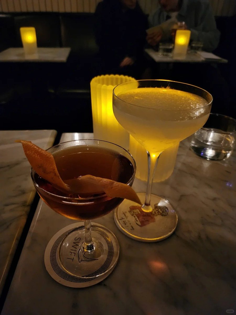 Embracing the tranquility of a rainy evening while sipping on a glass of wine. A moment to pause, relax and appreciate the simple joys in life.