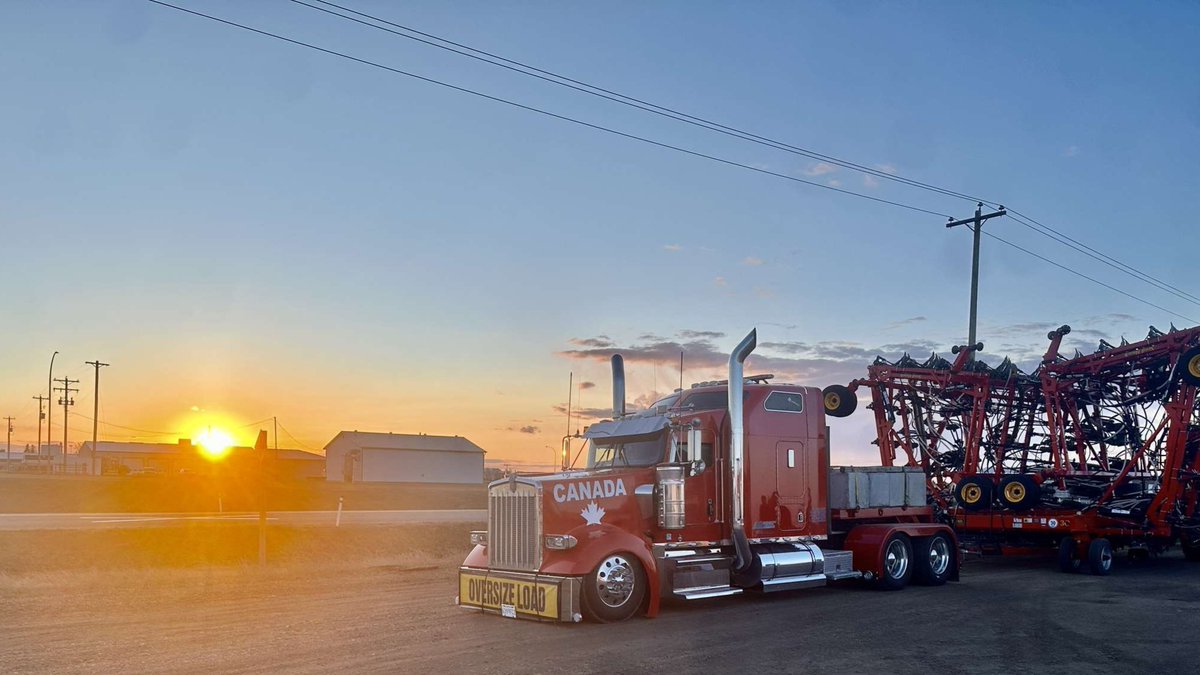 ChrisBarber1975's tweet photo. Rolling north in Big Red, hauling a seeder today. Sheโs not just a 2022 symbol of Canadiansโ fight for freedomโsheโs my lifeline, putting food on my familyโs table. Now the govโt wants to seize her, threatening our livelihood. #SaveBigRed #Freedom https://t.co/m3uiQD9y5d