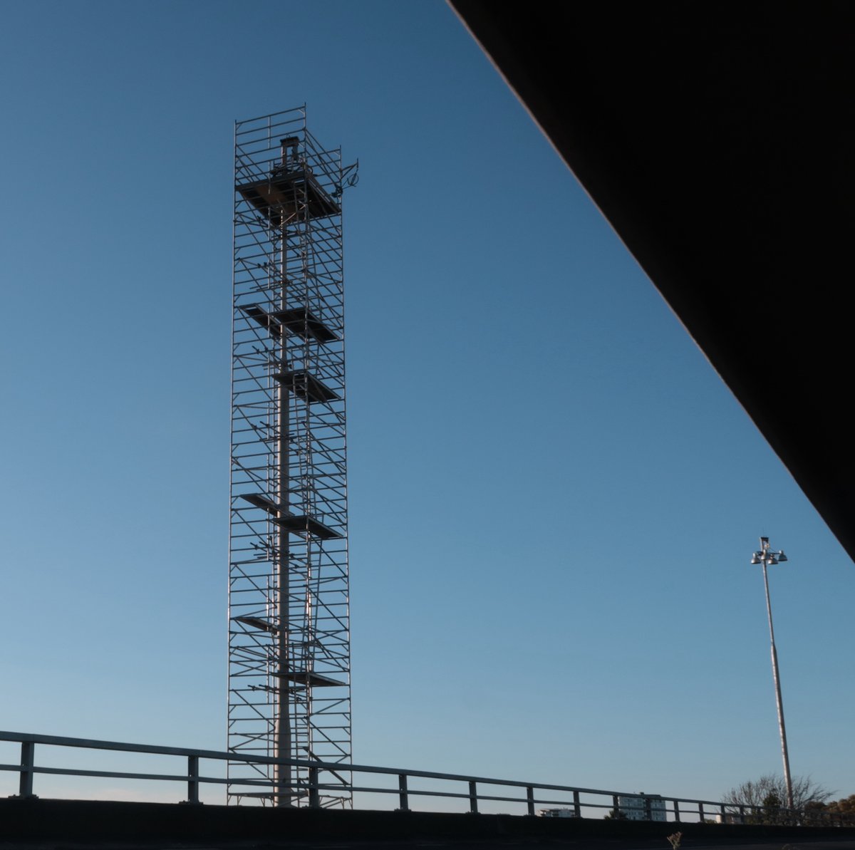 Scaffolded lighting tower on the Dominion Rd extension.