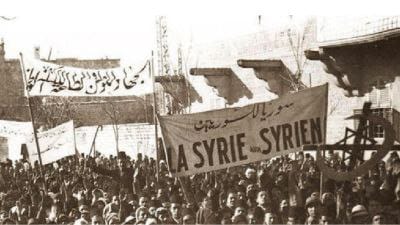 كم لنا من #ميسلون نفضت عن جناحيها غبار التعب 
كم نبت اسيافنا في ملعب وكبت اجيادنا في ملعب 
قم يا ابا ريشة  حققنا النبوءة قم يا شوقي  لتناجي جلق وانشد رسم من بانو  فقد مشت على الرسم احداث وازمان قم يا جبري فكل فؤاد في جلاءهم نشوان قد لعبت فيه العناقيد هذا العيد ليس ككل الاعياد