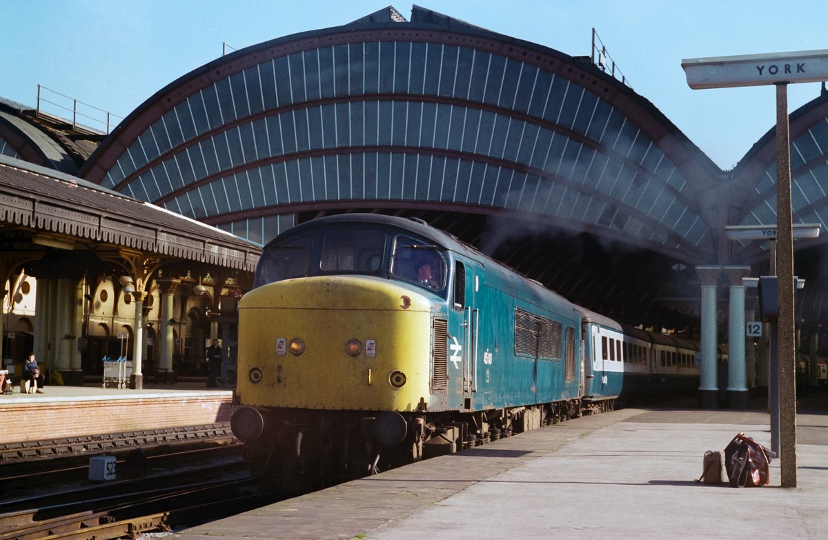 nickbro76777852's tweet photo. Had I been paying attention &amp; posted this one yesterday it would have qualified as an #OnThisDay and a #MidWeekPeak. Anyway, the location is the old Platform 9 at York as 45140 makes a spirited departure with 1E95, the 1145 Cardiff - Newcastle on 16th April 1981. https://t.co/7ZNppAbwpU