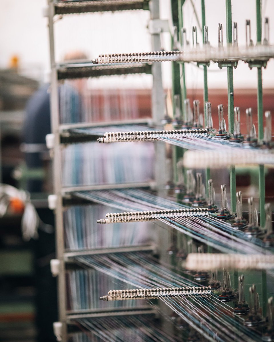 harristweedheb's tweet photo. Every warp beam in the Shawbost Mill begins here  — over 1,400 yarns drawn through and tied by precision. The warping process is the last stop before the journey continues at the loom, in the heart of a weaver’s home. 

#HarrisTweedHebrides #warping #HarrisTweed https://t.co/AYCmGAKSmC