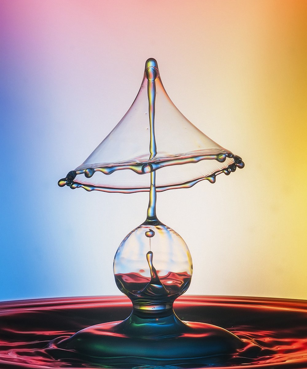 I'm thrilled to share this captivating abstract photo of colliding water drops, full of dynamic shapes and stunning colors. Bring a unique piece of art into your space! Buy it here: [art1poz.picfair.com] 📸#waterdropphotography #abstractart #homedecor #buyart #picfair