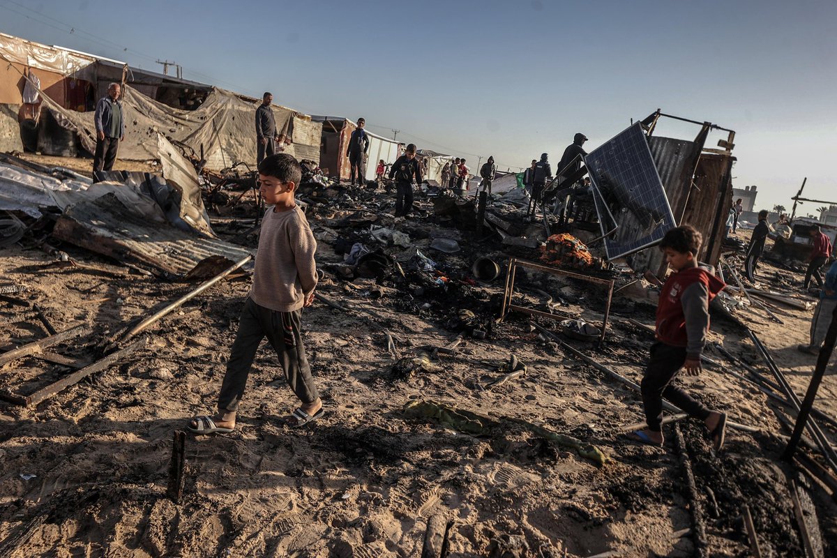 Palestinians inspect the damaged area after an Israeli airstrike targeting tents sheltering displaced civilians in Khan Yunis, Gaza on April 17, 2025. Gaza's civil defence said the Israeli army struck tents in in al-Mawasi, Khan Yunis, where many Palestinians had sought refuge