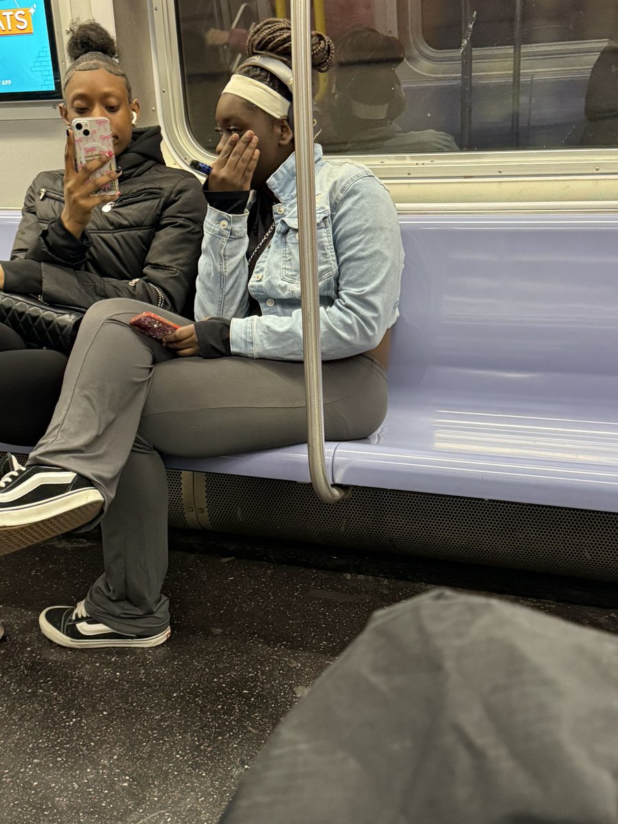 ginadimeo's tweet photo. These two were smoking e cig. I told them that it’s not allowed and they started to make fun of me. @MTA @NYPDChiefOfDept @NYPDTransit @NYPDCommAffairs . Happening on an uptown bound F train today https://t.co/x4V7odXGZV