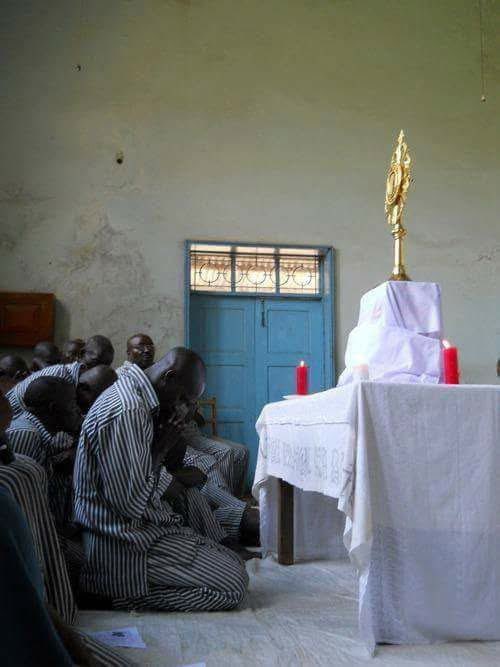 Eucharistic adoration at a prison in Africa