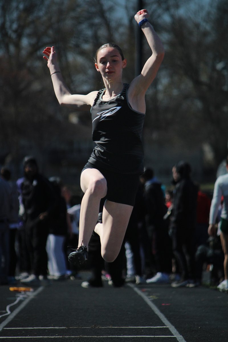 Maria Sanchez De Los Reyes was practicing street photography, for Photography Art 3, at the Rockets recent track meet at Omaha Westside. Owen, Cameron, Adam, Canan, Tommy, Israel, Madi, and Quincy participated in the long jump and 400 meter dash.