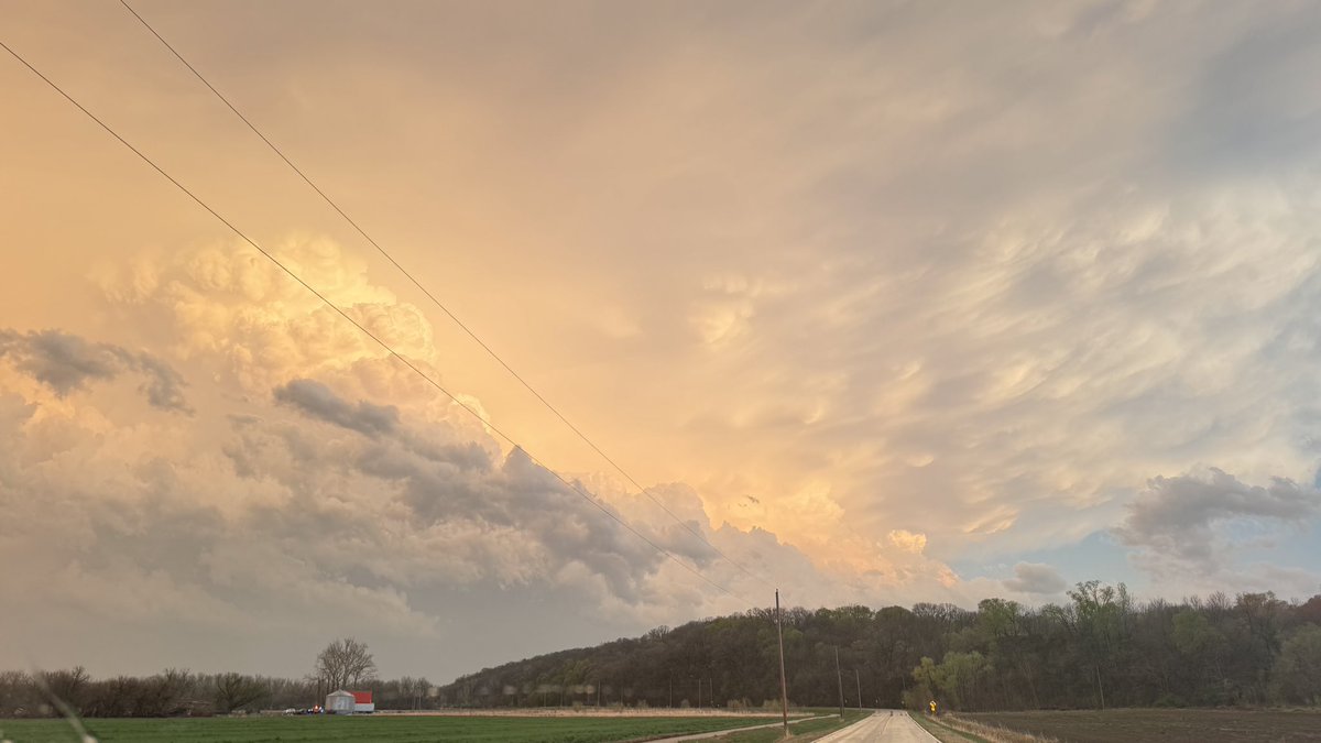 cvacanti's tweet photo. @KETVstormteam caught the tornado on my dash cam evacuating near Ponca Rd. Bluebird lane got a direct hit. Rainbow! https://t.co/zvu6VRInvC