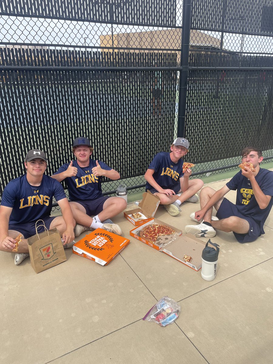 Post-match fuel done right. Varsity boys celebrating the grind with some well-earned pizza and good vibes on court.

#GoldStandard