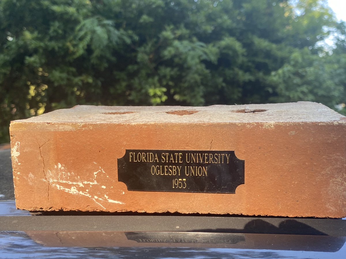 fineout's tweet image. A brick from the old FSU student union. Still solid. Still here. My school. My home.