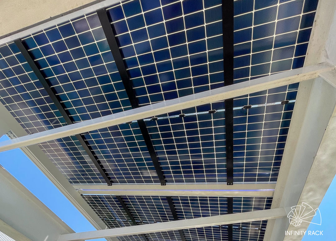 InfinityRack's tweet photo. Have a structure, just need a roof? 🛠️ We’ve got the solution.

Our roof-only option fits seamlessly on existing builds—like this sharp commercial walkway. Shade + protection 🌞

📩 Request yours: https://t.co/vclbqGe9Wc

#InfinityRack #SolarCanopy #CleanEnergy #CustomBuilds https://t.co/vpbprUZXd0