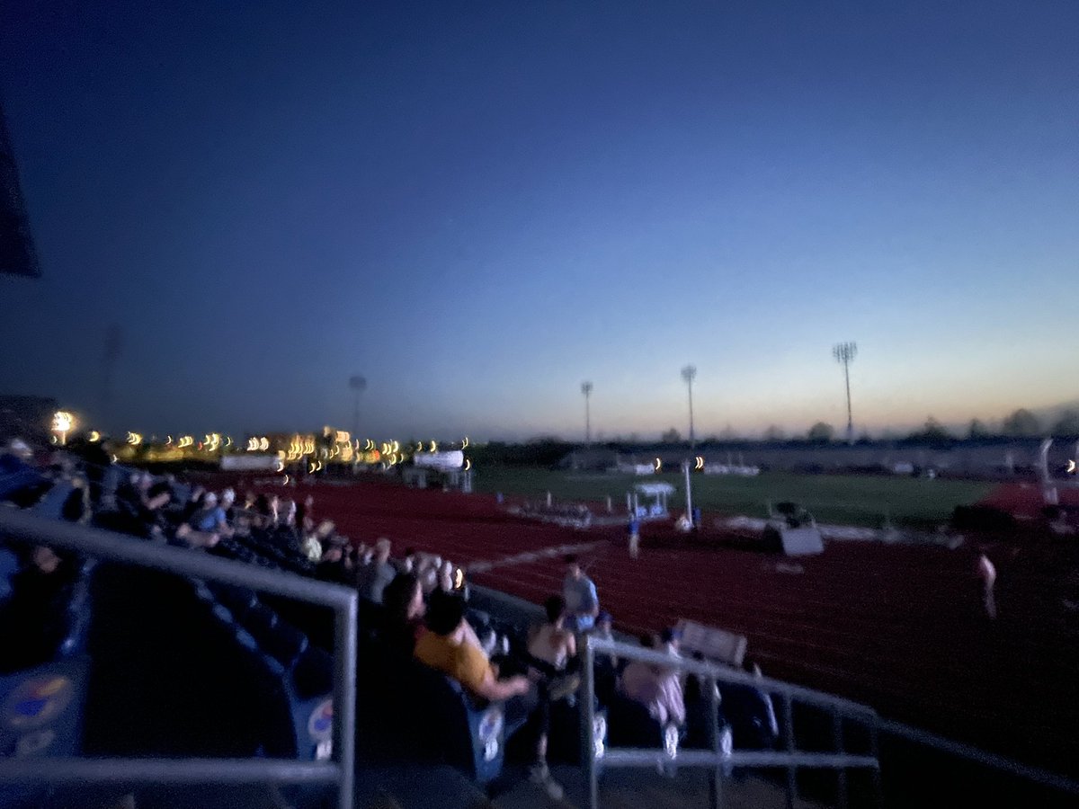 S_L_Alexander's tweet photo. Lights went out mid 3000m Men’s Steeplechase @ #KansasRelays and they kept going. (North end of the track had the scoreboard. The South, darkness w/ iPhone flashlights directed at the hazards.) https://t.co/twleXQV0sS