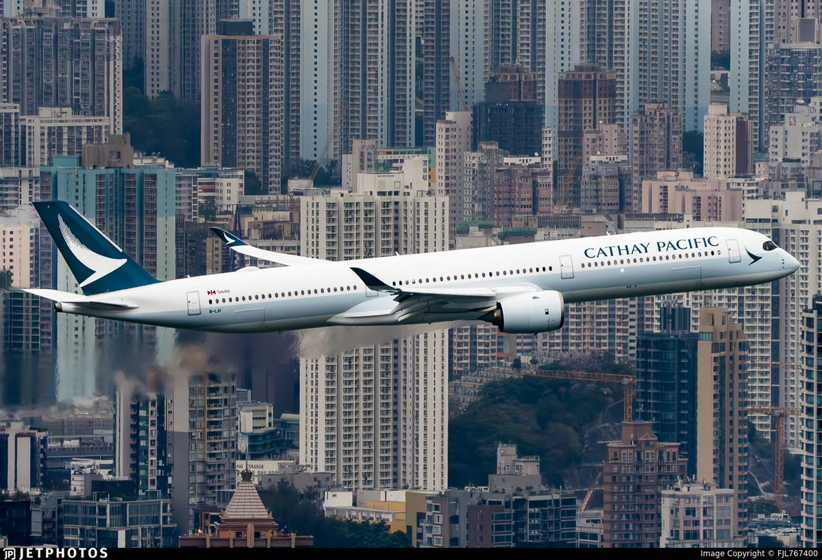 Cathay Pacific with a low altitude flight around Hong Kong celebrating the 100th anniversary of the old Kai Tak. jetphotos.com/photo/11682398 © FJL767400