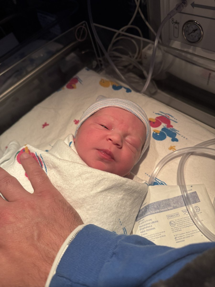 My boy is here. His brother is excited! Mom and baby are doing well!q