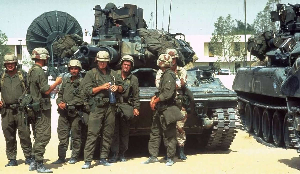 M551A1 TTS Sheridan crews staying hydrated in Saudi Arabia in the prelude for Operation Desert Storm.

Hey how come that guy gets actual camo and the rest of em dont...