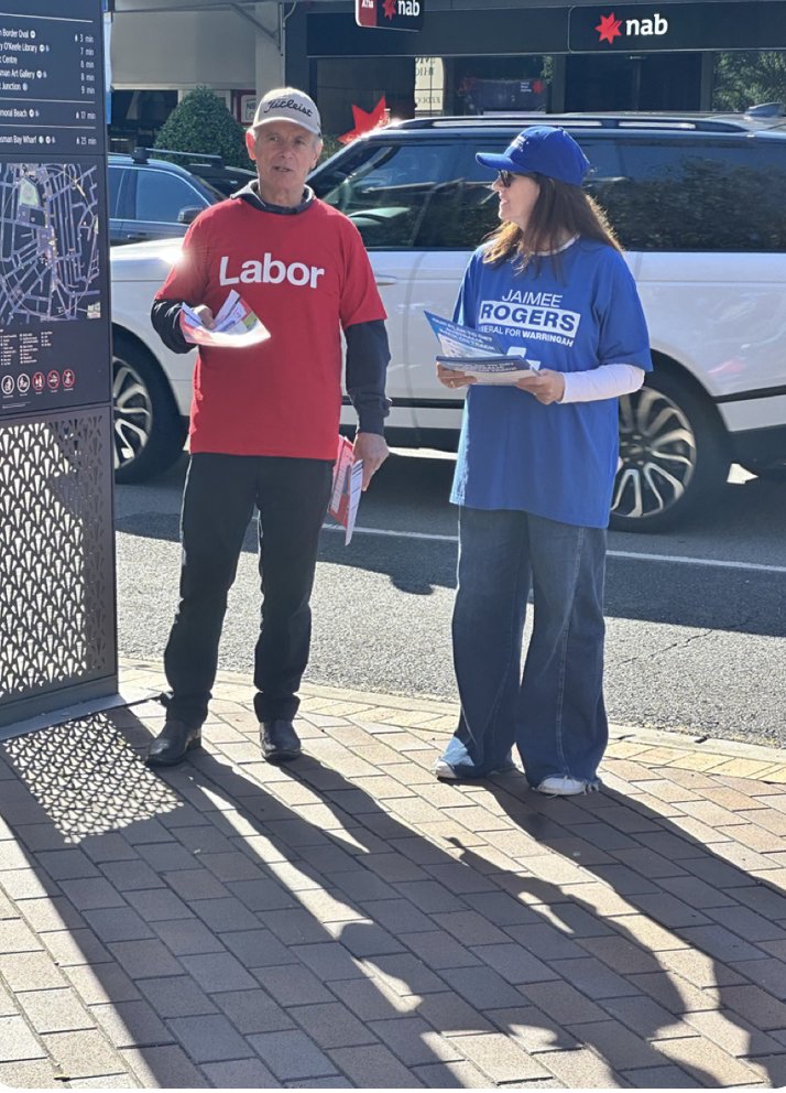 Australian at its best. No aggro, and having a bit of a chat. Both doing their best for their candidate, neither of whom will be likely to get up, but still doing their bit. 
#Auspol2025 #AroundTheGrounds