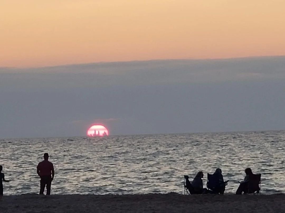 The Chicago skyline is visible from the Indiana Dunes