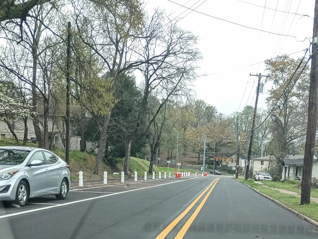 BDOT upped their game with this new protected bike lane along Rugby Ave! Reach out to your city councilor to let them know you love it!