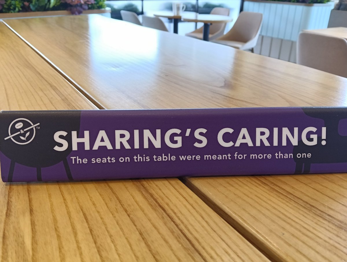MarwanMahmud's tweet photo. People sit AT the table, not ON the table 😁 @CBTLmalaysia https://t.co/X51Lsy7GMU